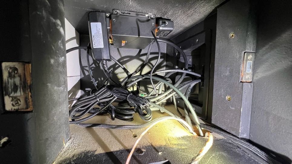 Concealed wiring and framing behind a fireplace TV install